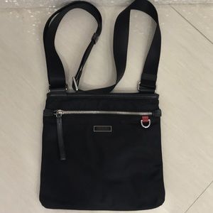 Tumi unisex crossbody bag.